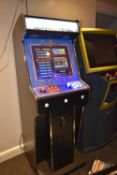 Track and Field themed video arcade machine with approximately 3000 original arcade games. Modern