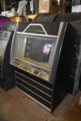 Rowe Ami 100 CD jukebox holding 100 CD's. U.S import. Complete but untested. It may be possible
