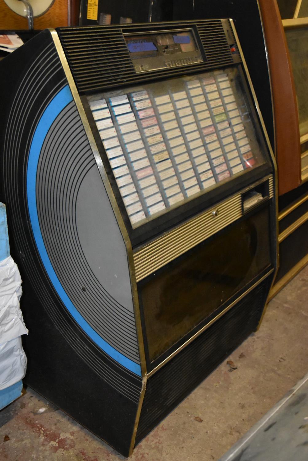 Rock Ola Supa Sound vinyl jukebox. U.S import. Complete but untested. It may be possible for this