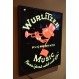 LED Wurlitzer sign with power transformer and remote control. Boxed, tested and working. There are