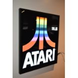 LED Atari sign with power transformer and remote control. Boxed, tested and working. There are three