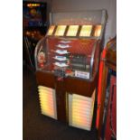 1940's / 1950's Ami model D jukebox. U.S import. Complete, tested and working. Please note: This