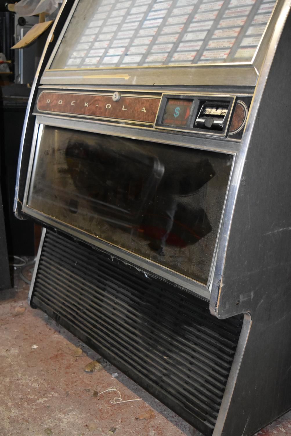 Rock Ola vinyl jukebox. U.S import. Complete but untested. It may be possible for this machine to be - Image 8 of 9