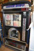 NSM Performer CD wall jukebox. Holds 100 CD's. U.S import. Complete but untested. It may be possible