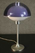 A Robert Welch Lumitron table lamp, stainless steel tulip design with weighted base and two part