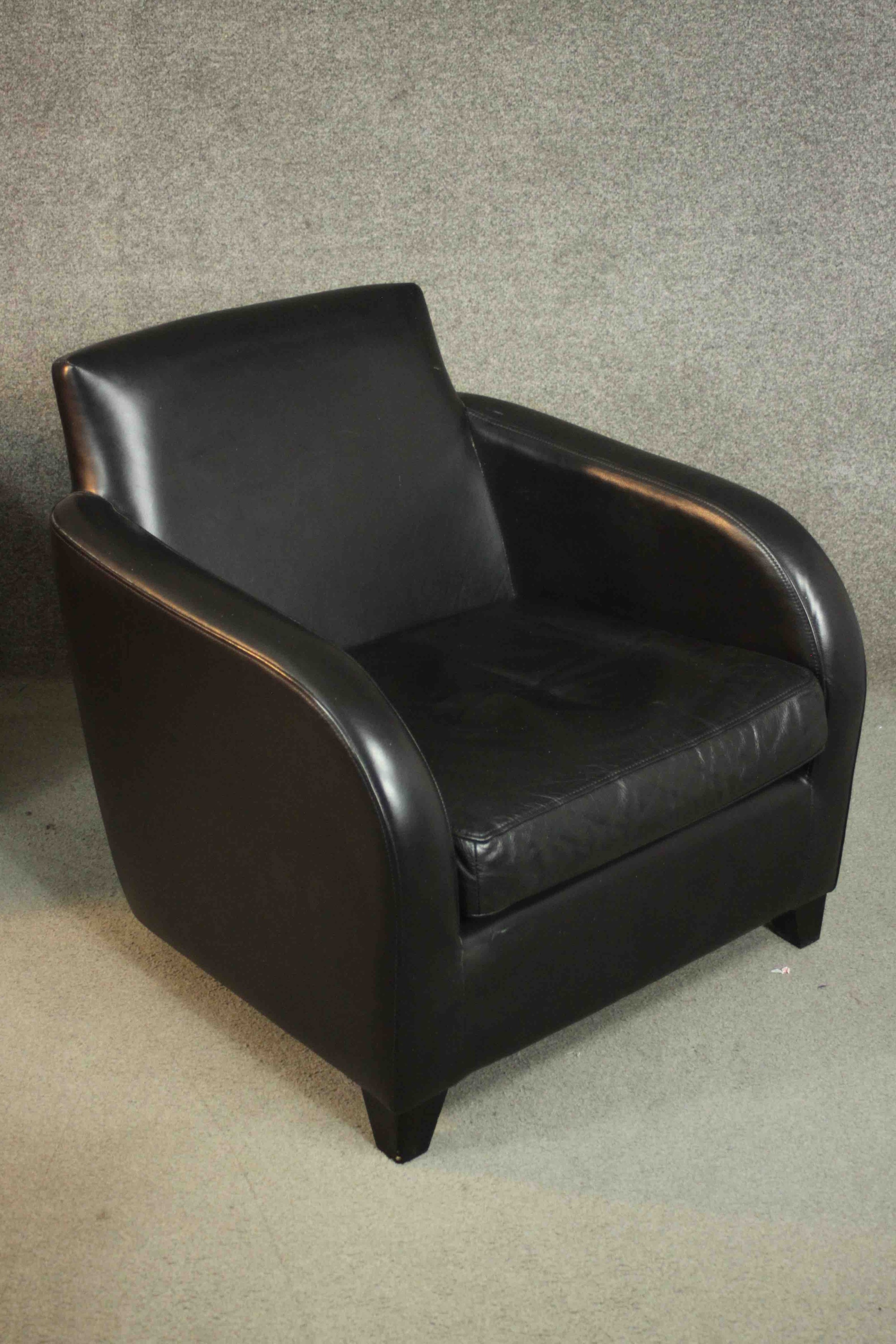 A pair of contemporary black leather armchairs, on tapering block feet, together with a matching - Image 5 of 10