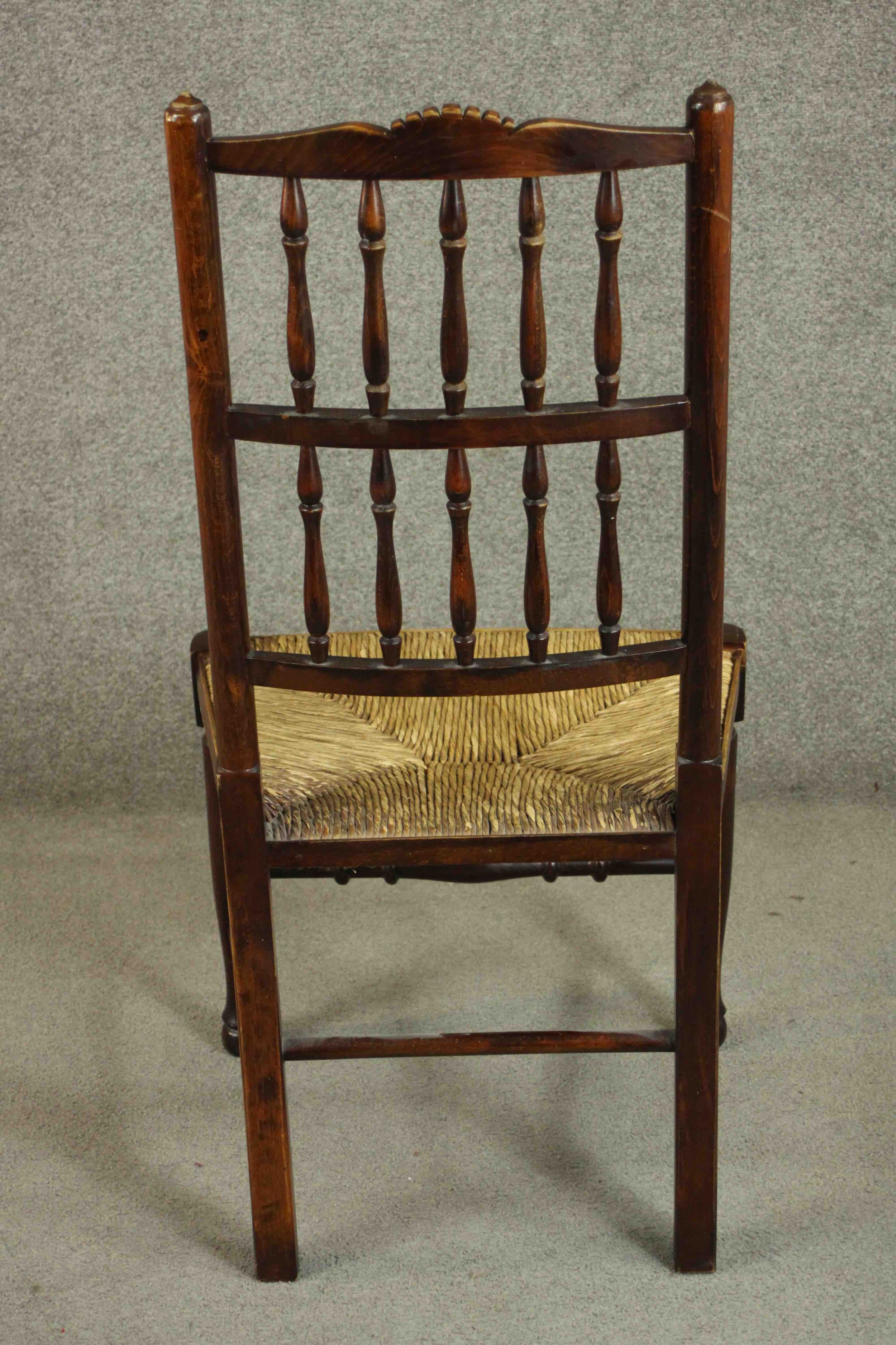 A set of four Lancashire stained beech country dining chairs, with a splindle back, over a rush - Image 6 of 10