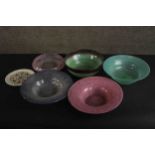 A collection of five art glass bowls and a Pietra dura plate. The glass with marbled pastel colours,