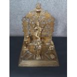 A 19th century Indian brass shrine with four removable brass deities. H.36 W.29 D.31cm.