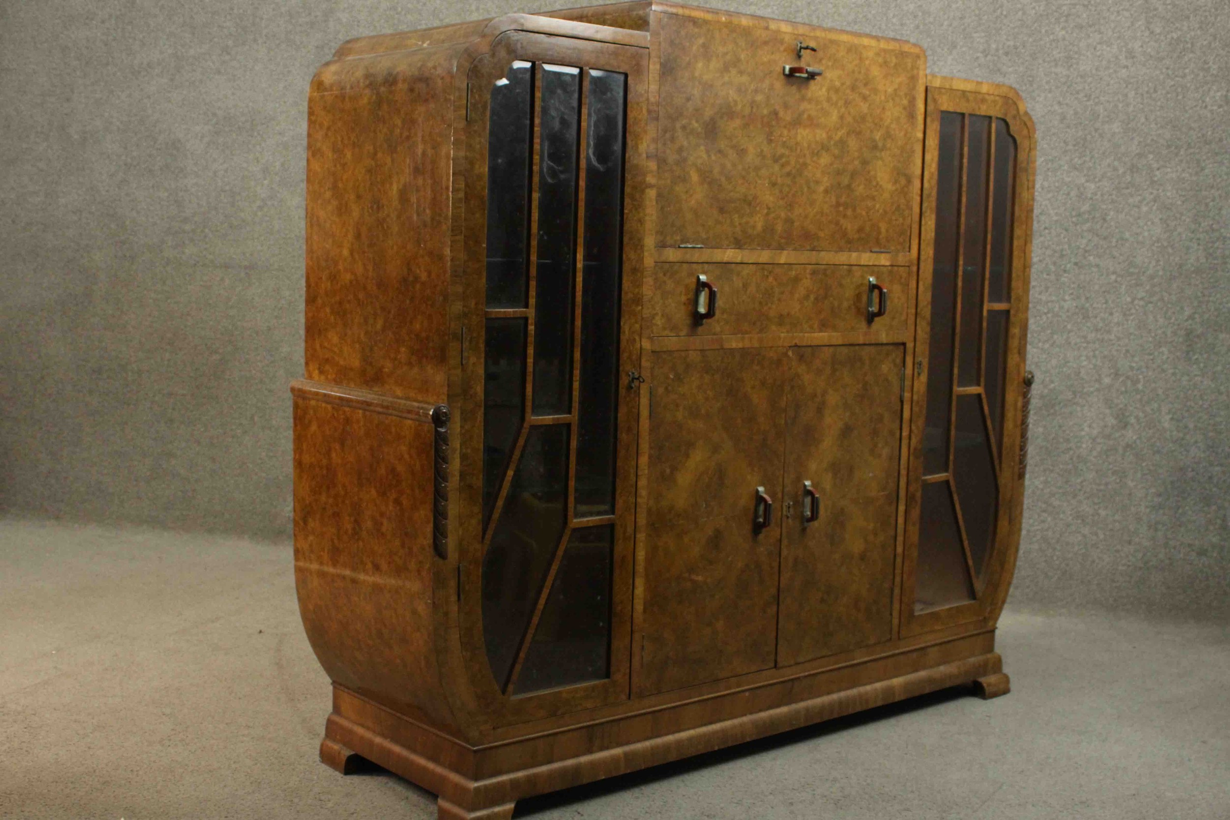 An Art Deco burr walnut cocktail cabinet with fitted and mirrored central mixing section flanked - Image 15 of 17