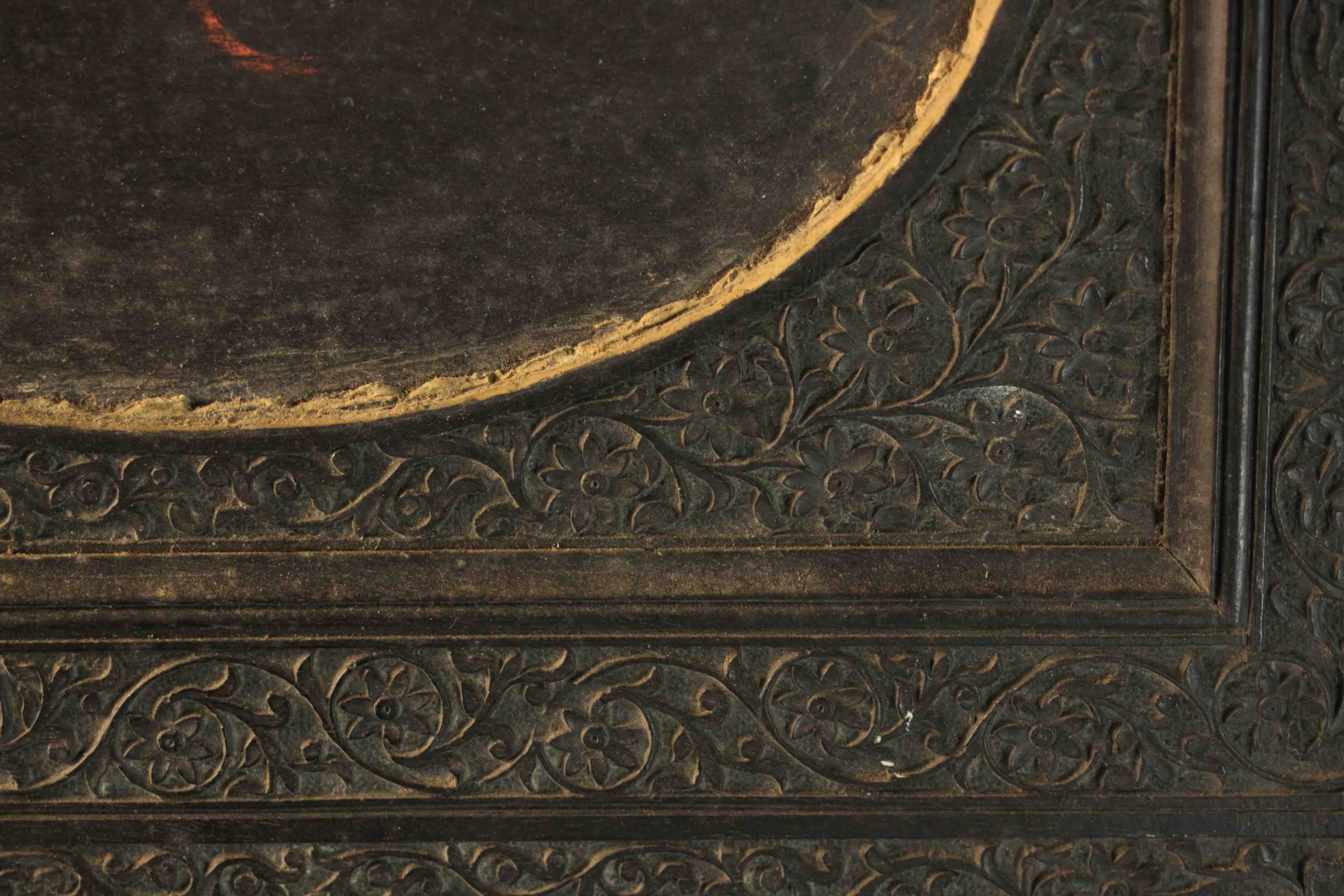 An Anglo-Indian ebonised carved easel picture frame with floral design and oval cartouche to centre. - Image 7 of 8