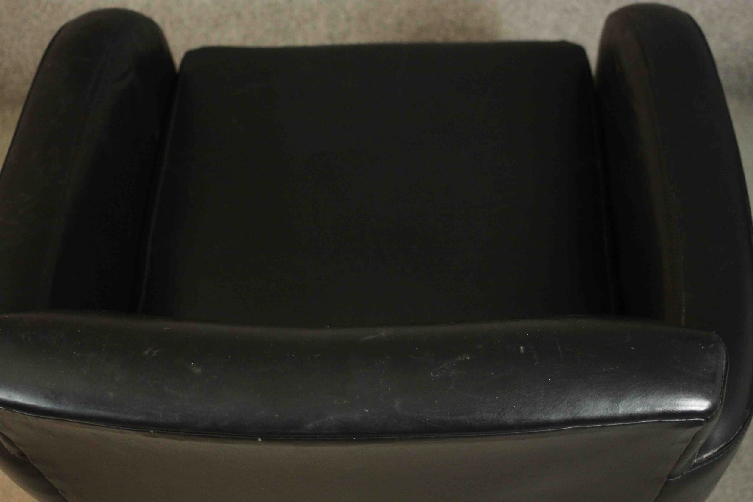 A pair of contemporary black leather armchairs, on tapering block feet. - Image 6 of 8