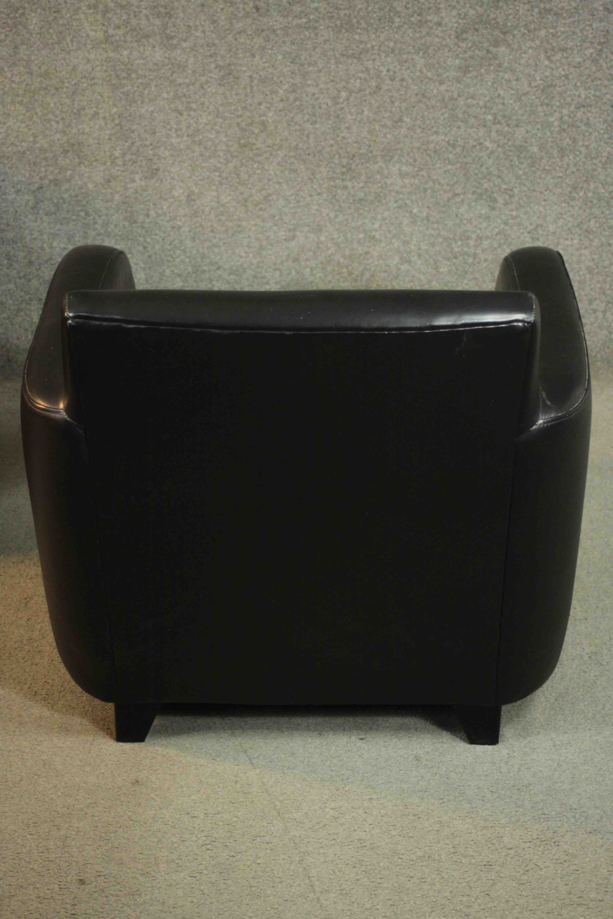 A pair of contemporary black leather armchairs, on tapering block feet, together with a matching - Image 8 of 10