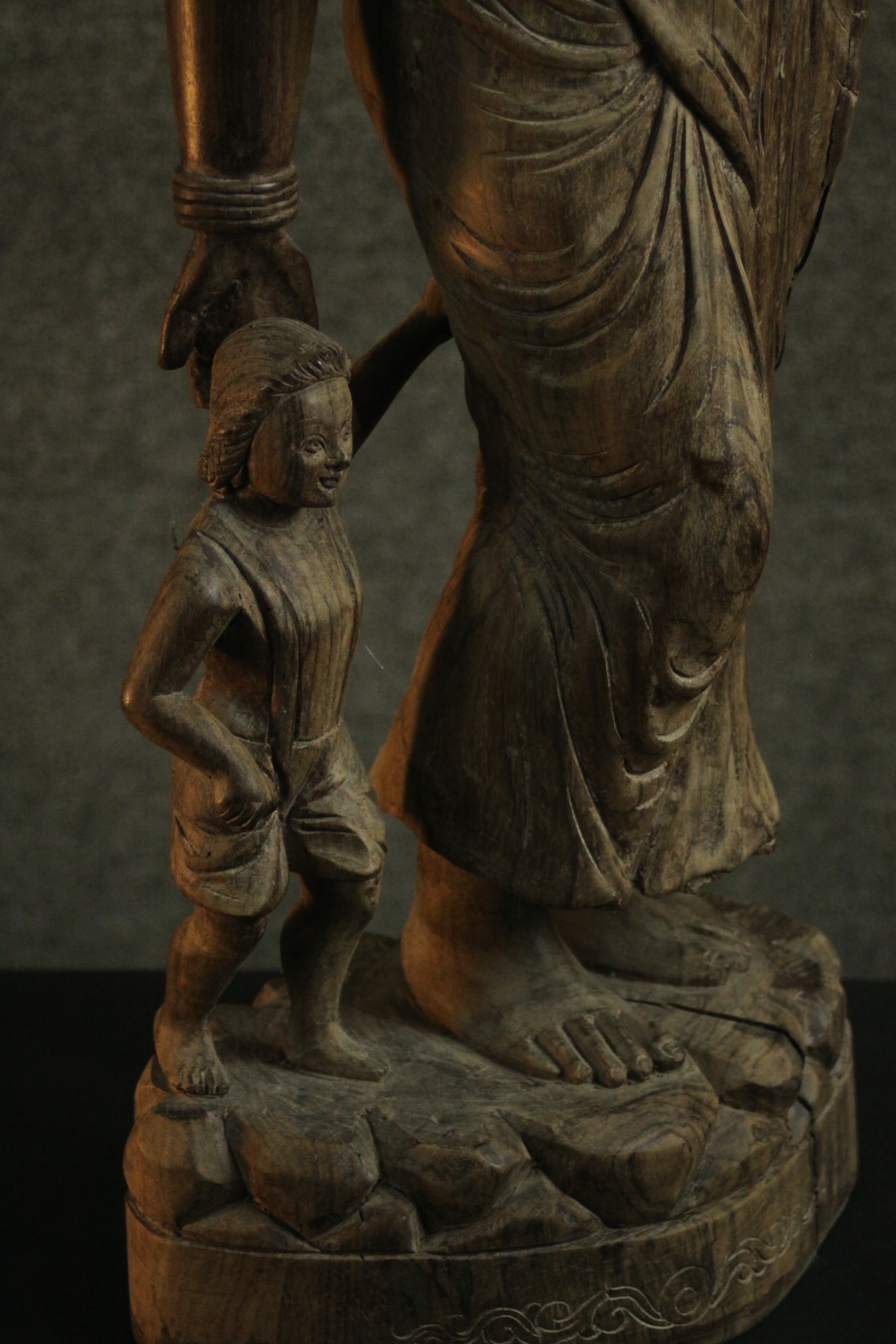 A 20th century carved figure of a woman holding her child's hand and carrying a water vessel. H.78 - Image 5 of 10