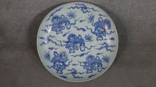 A very large Chinese 19th century porcelain blue and white hand painted charger decorated with