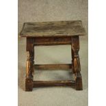 A 17th century and later oak joynt stool, the rectangular seat with a moulded edge over a moulded
