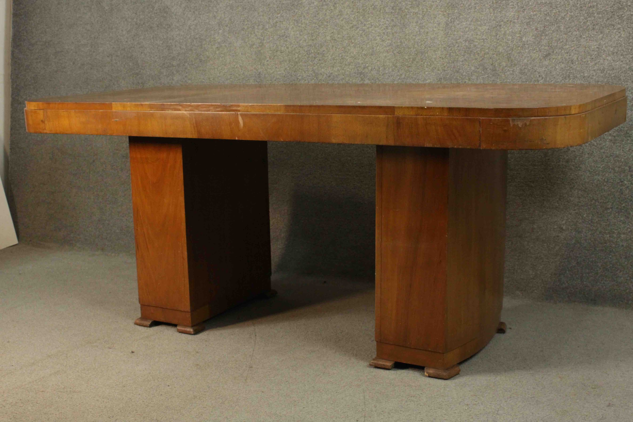 An Art Deco burr walnut and crossbanded dining table with rounded rectangular top on twin pillar - Image 4 of 9