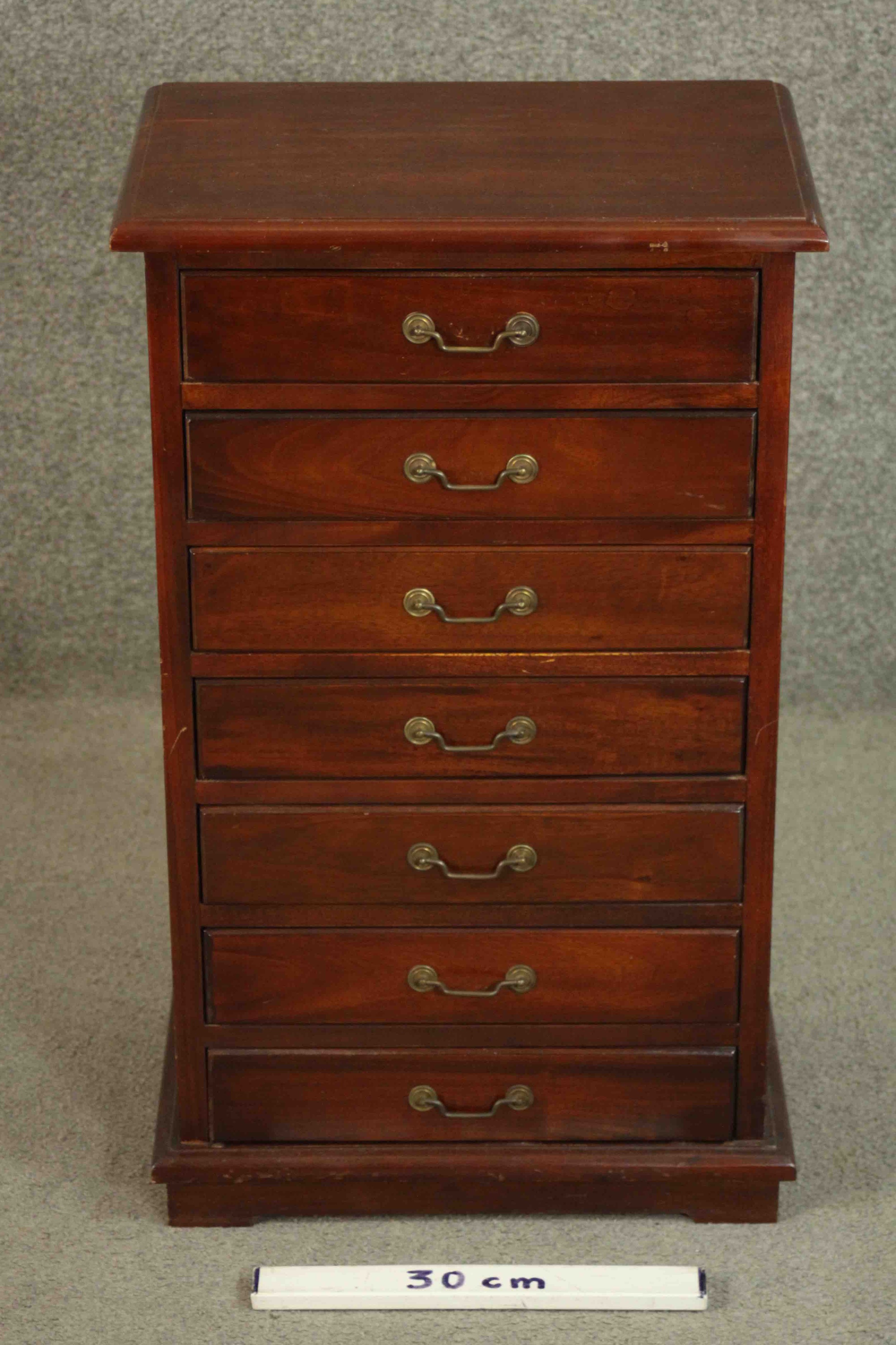 An Eastern hardwood specimen cabinet of seven drawers on block feet. H.72 W.44 D.31cm. - Image 2 of 8