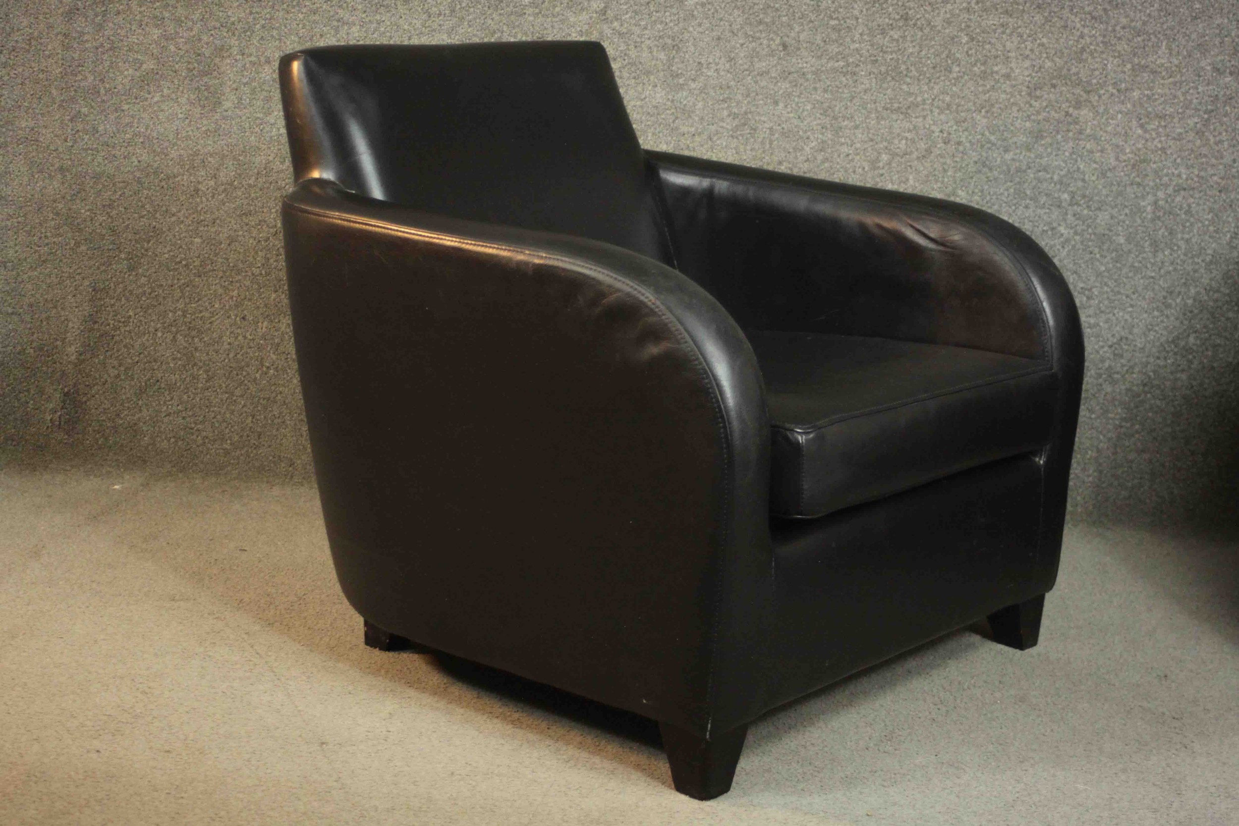 A pair of contemporary black leather armchairs, on tapering block feet. - Image 3 of 8