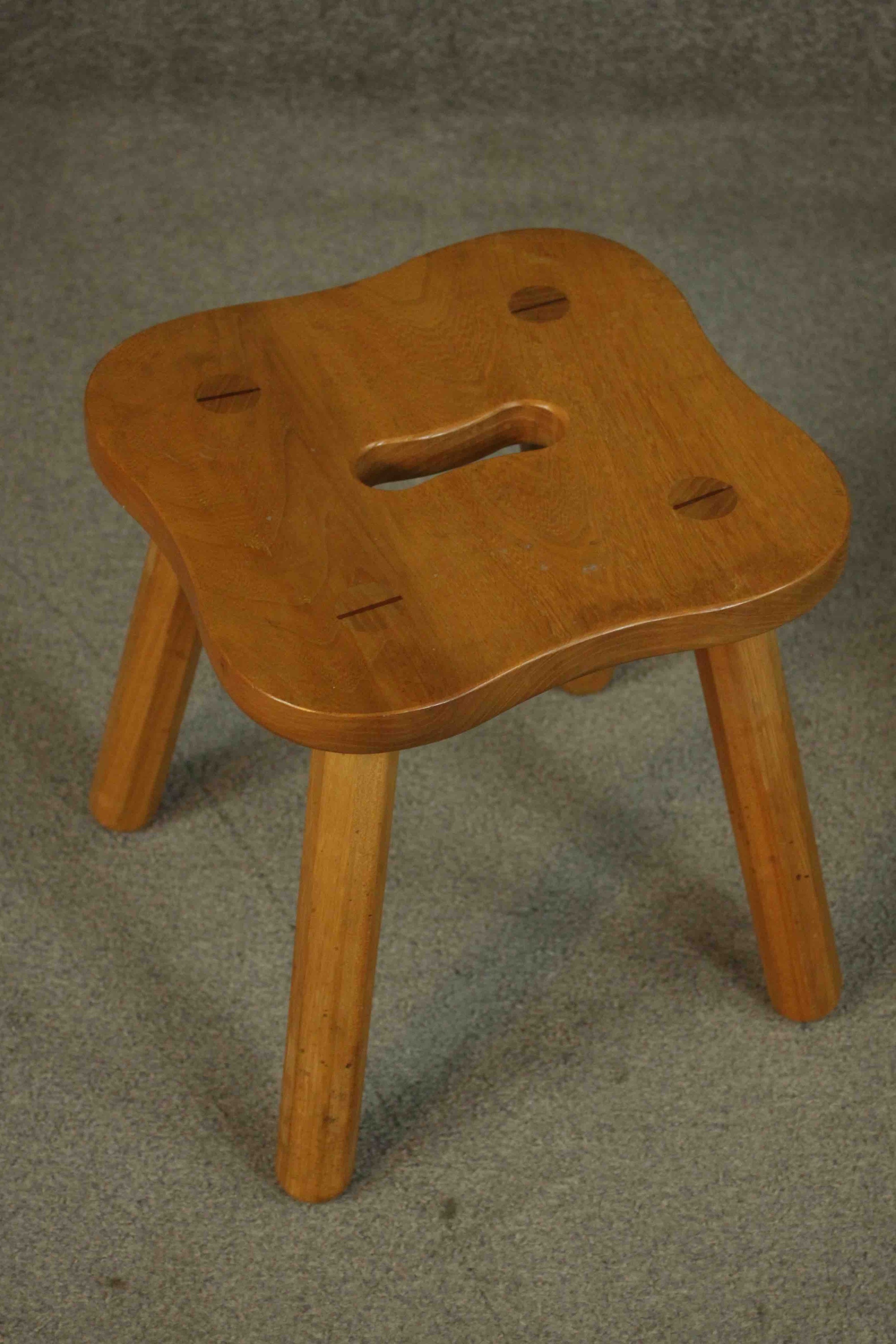 A collection of three stools, including an elm example with a shaped seat and hand hole, a stool - Image 3 of 5