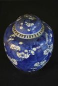 A 19th century Chinese lidded blue and white hand painted porcelain prunus blossom design ginger