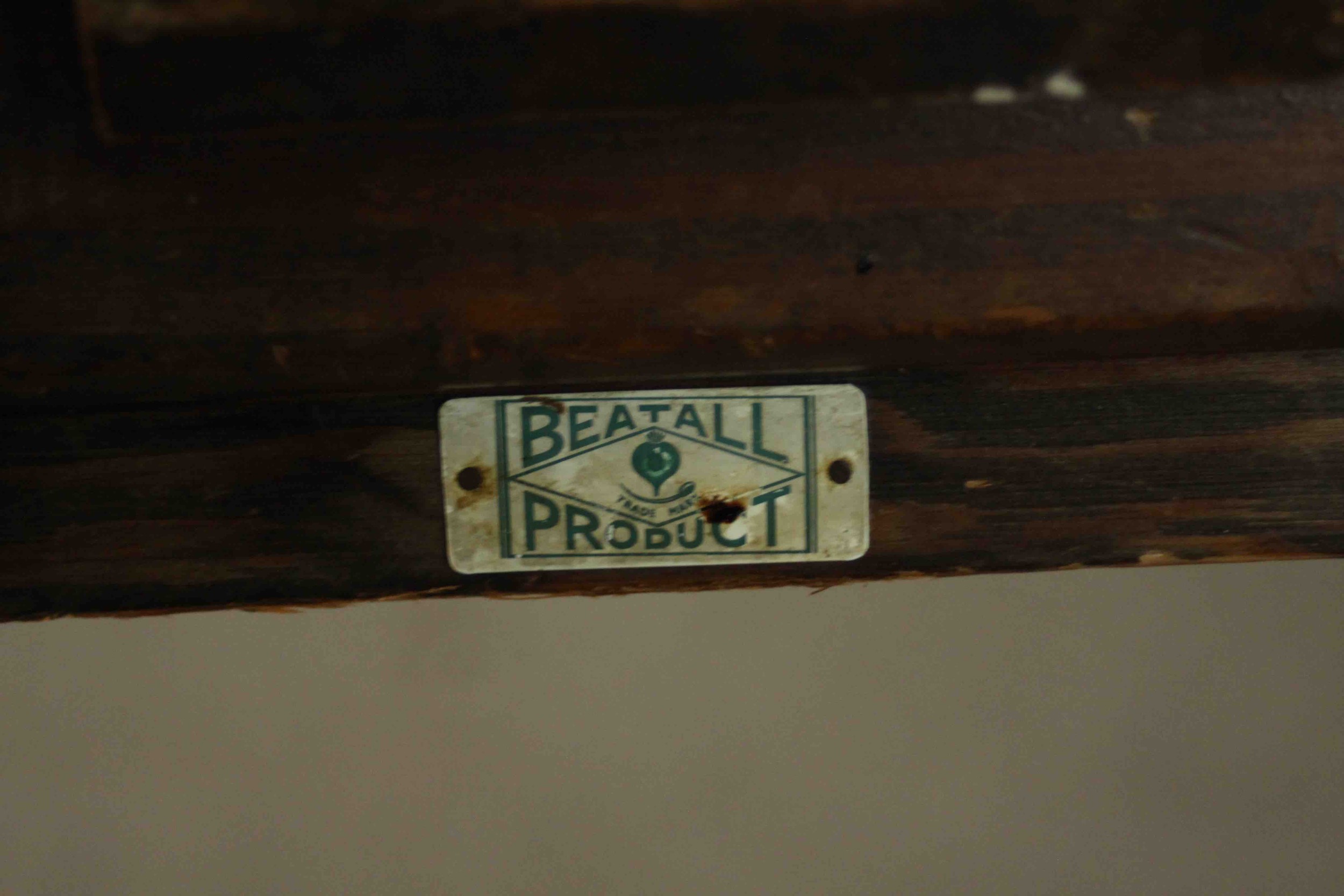 A vintage oak writing table with frieze drawer and maker's label on square supports. H.76 W105 D. - Image 6 of 7