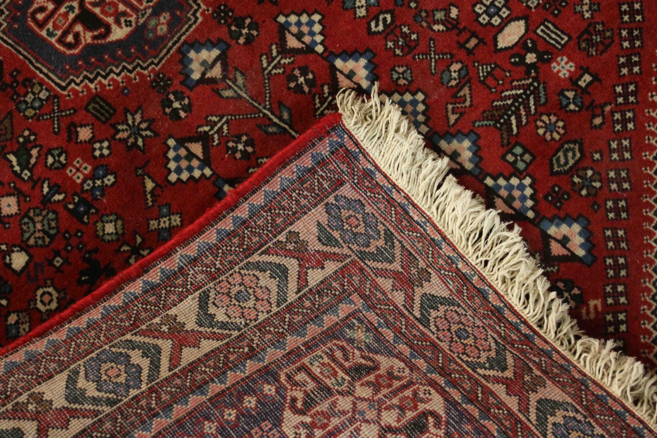 A Persian Bidjar rug the central medallion with stylised floral design within spandrels and multiple - Image 5 of 5