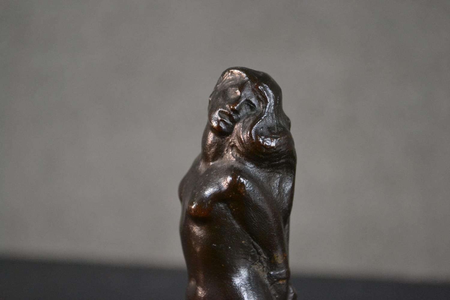A 20th century bronze figurine of a nude woman tied at a stake with dragon at her feet. Dated - Image 5 of 8