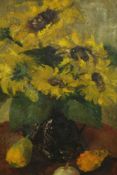 A framed oil on canvas, Impressionist style sunflowers, indistinctly signed. H.90 W.64cm.