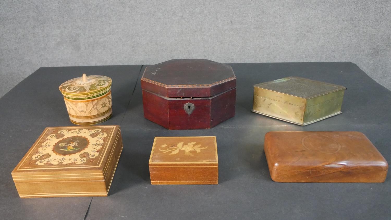 A miscellaneous collection of six lidded boxes to include a Georgian mahogany and inlaid example.