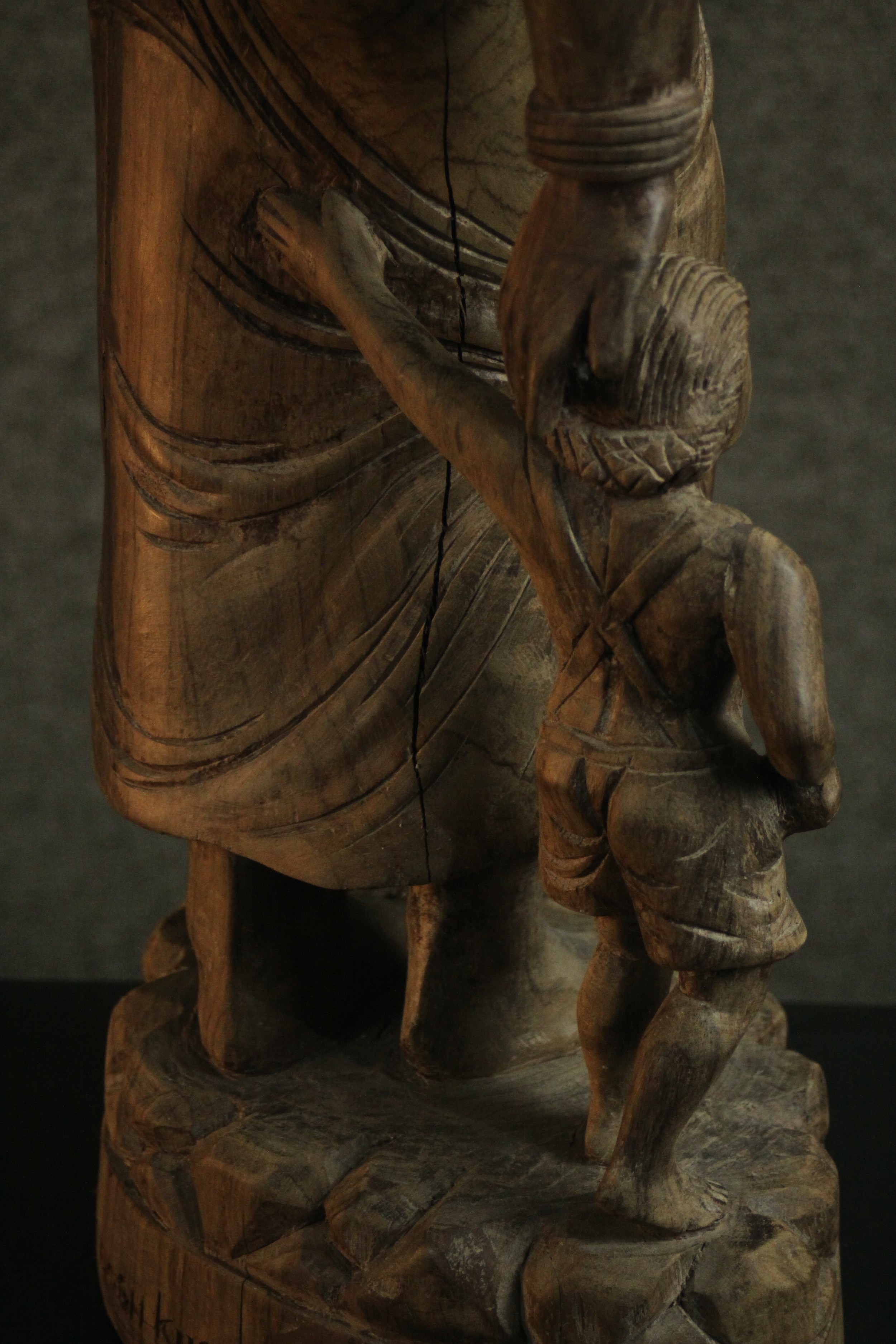 A 20th century carved figure of a woman holding her child's hand and carrying a water vessel. H.78 - Image 9 of 10