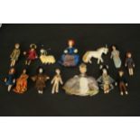 A collection of fourteen antique handmade fabric dolls and animals. L.23 W.18cm. (Box)