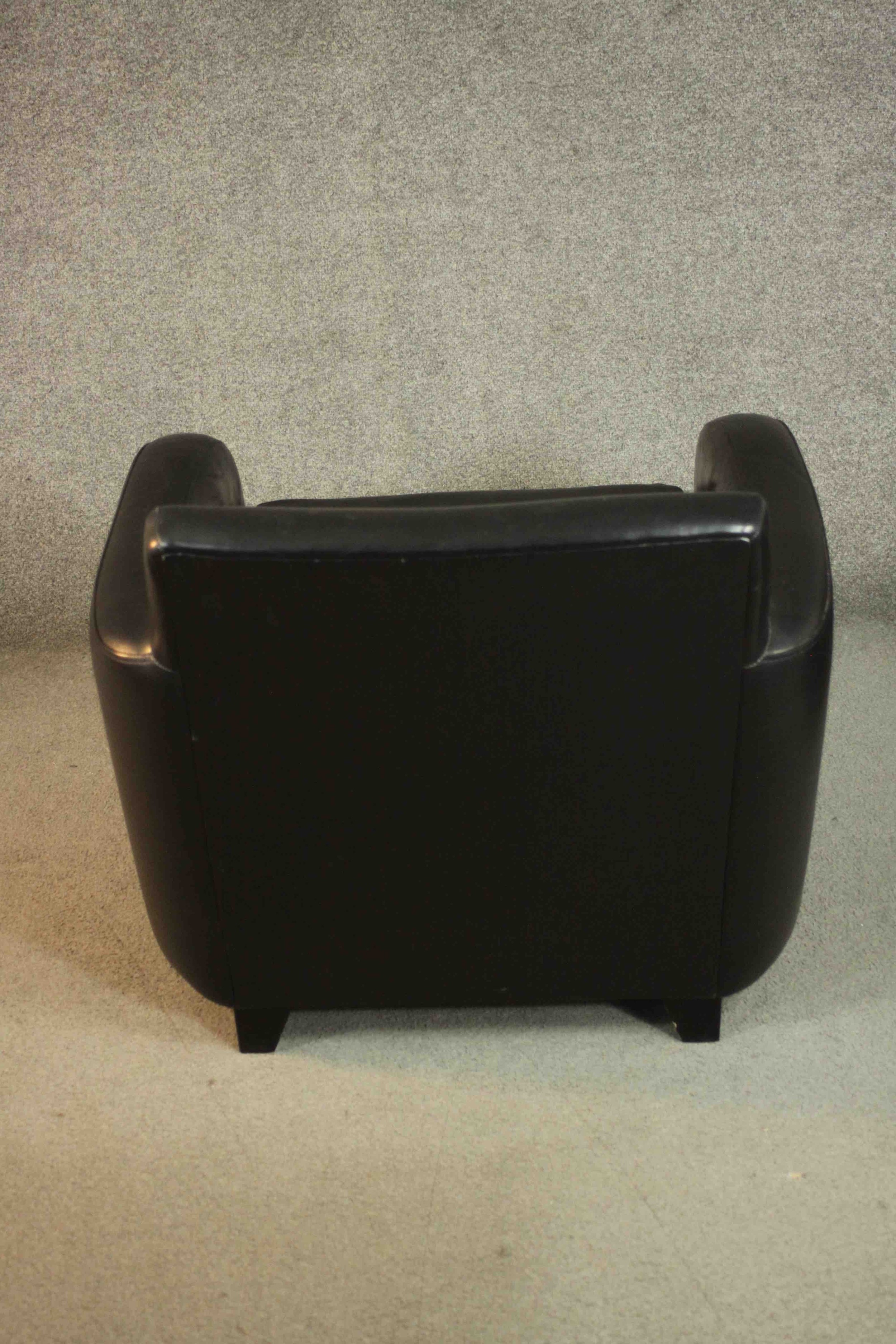 A pair of contemporary black leather armchairs, on tapering block feet. - Image 5 of 8