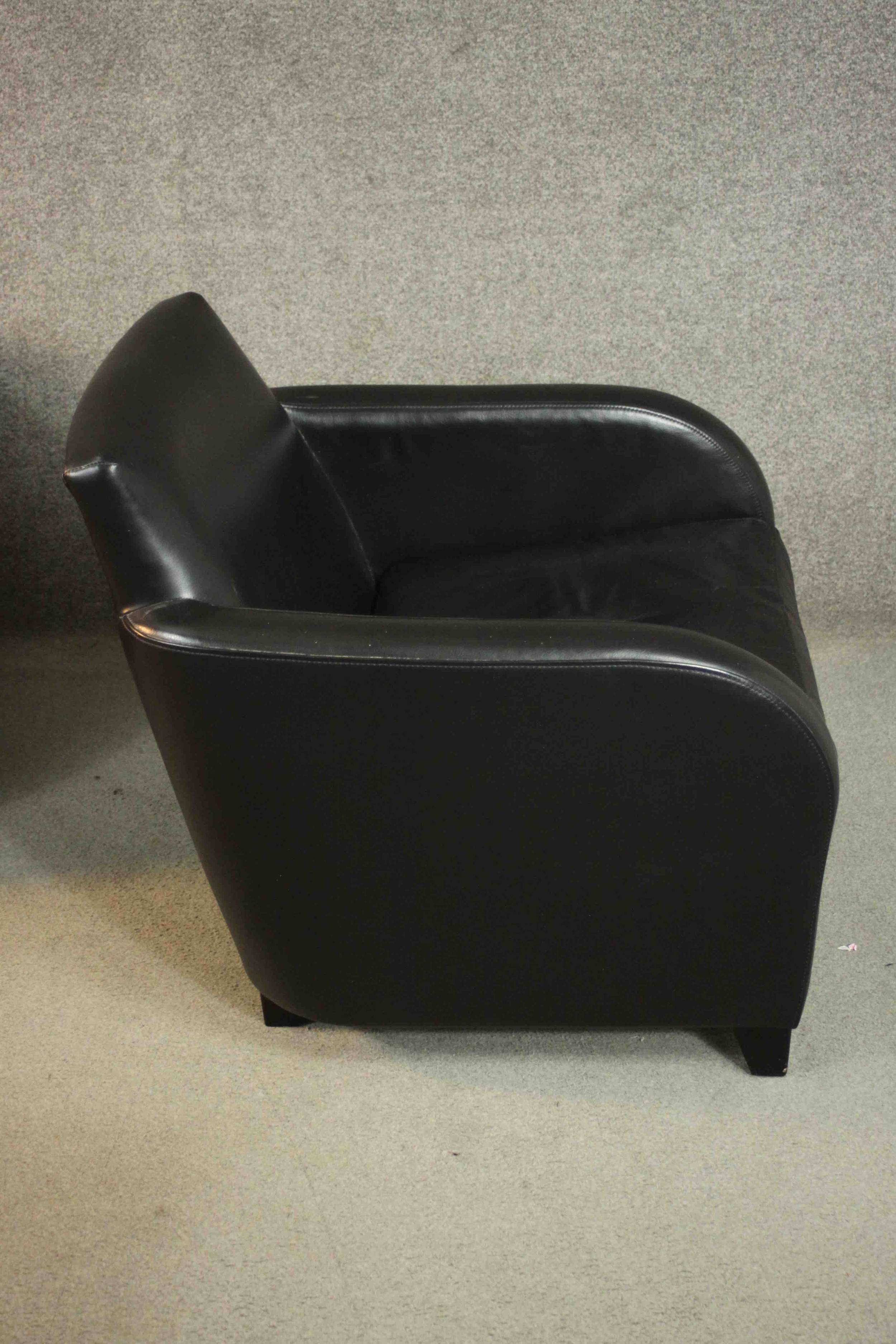 A pair of contemporary black leather armchairs, on tapering block feet, together with a matching - Image 6 of 10