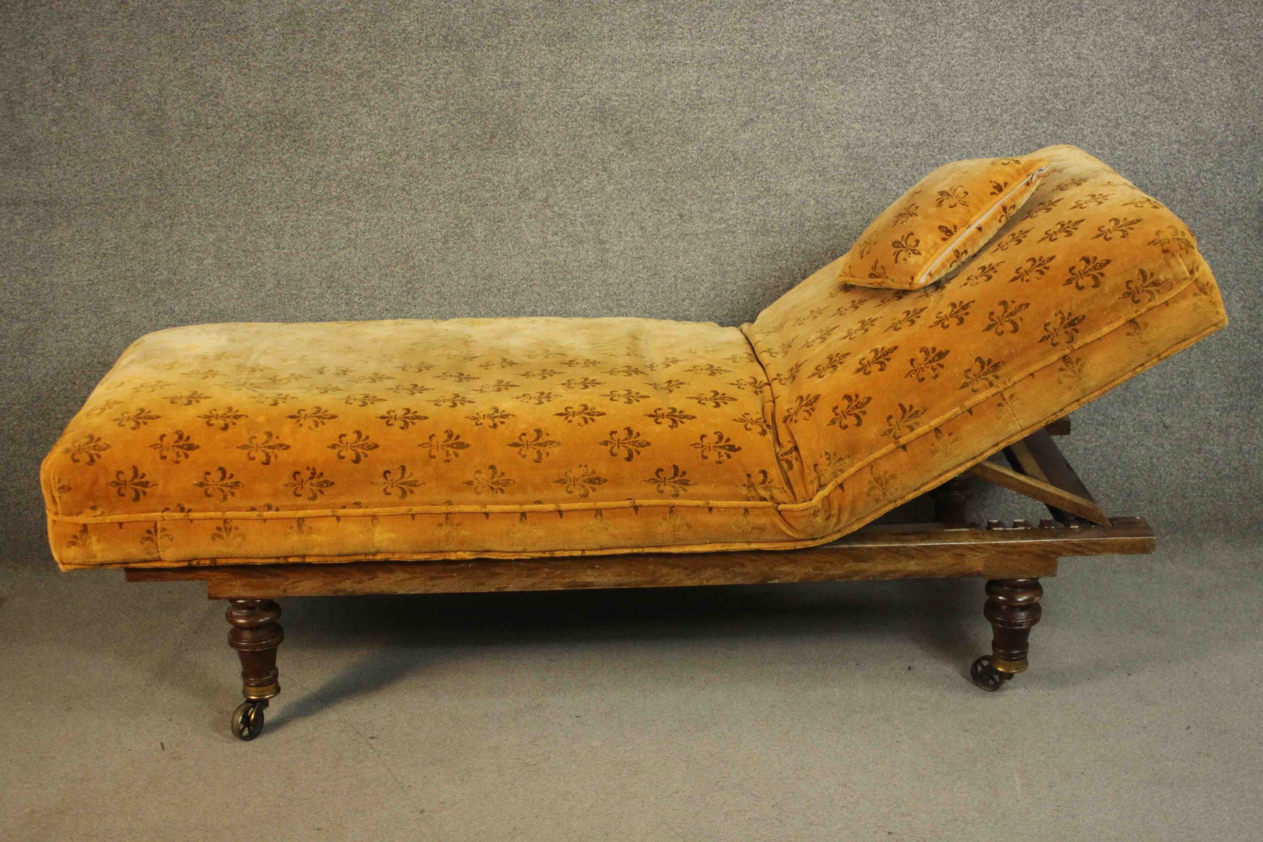 A Victorian daybed or doctor's examining bed, upholstered in a patterned mustard fabric with a loose - Image 3 of 11