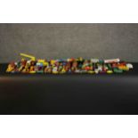 A large collection of approximately eighty play worn die cast vehicles. Various makes including