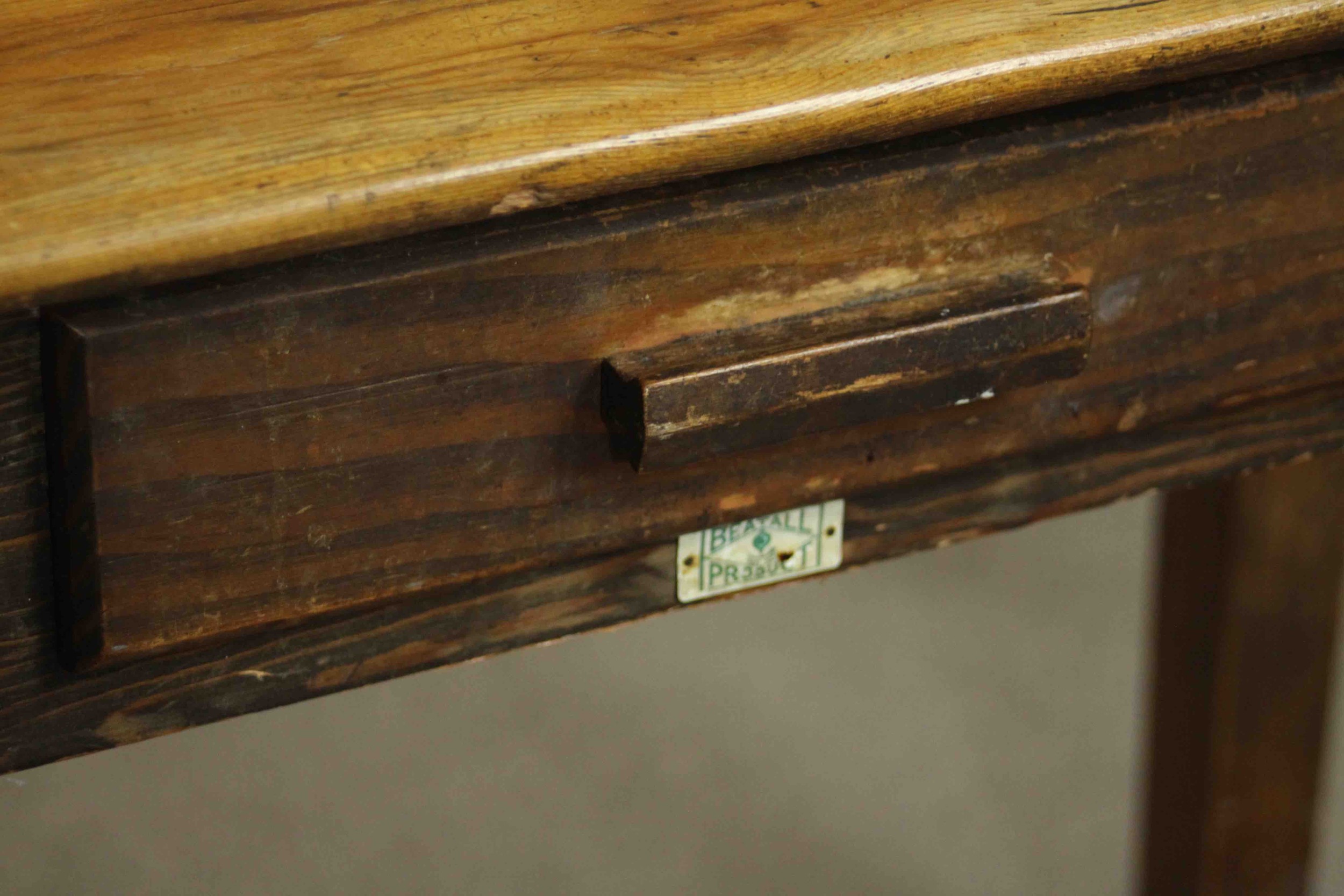 A vintage oak writing table with frieze drawer and maker's label on square supports. H.76 W105 D. - Image 5 of 7