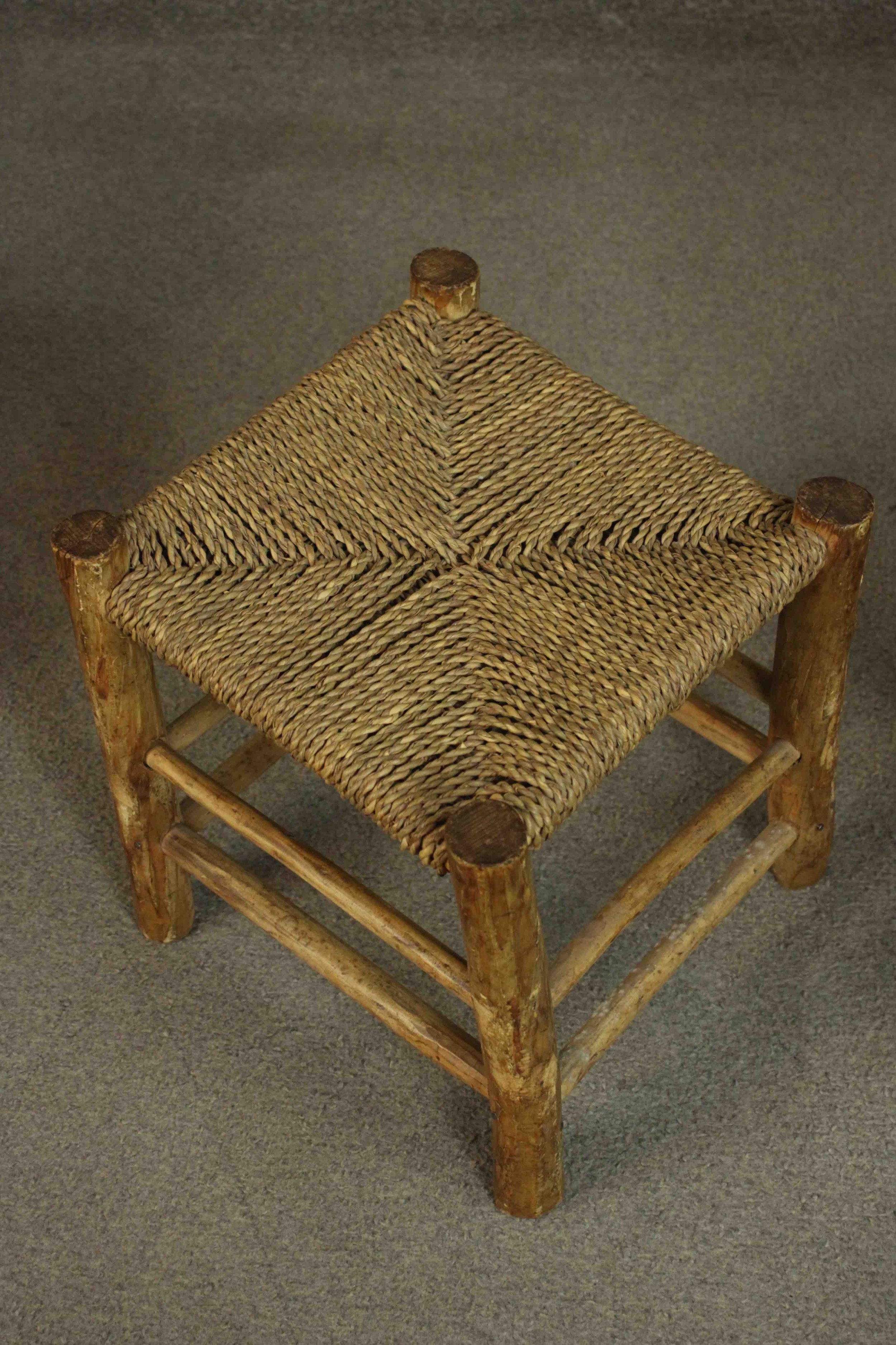 A collection of three stools, including an elm example with a shaped seat and hand hole, a stool - Image 4 of 5