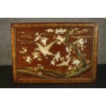 A 19th century Japanese inlaid bone and mother of pearl hardwood panel with gilded lacquer