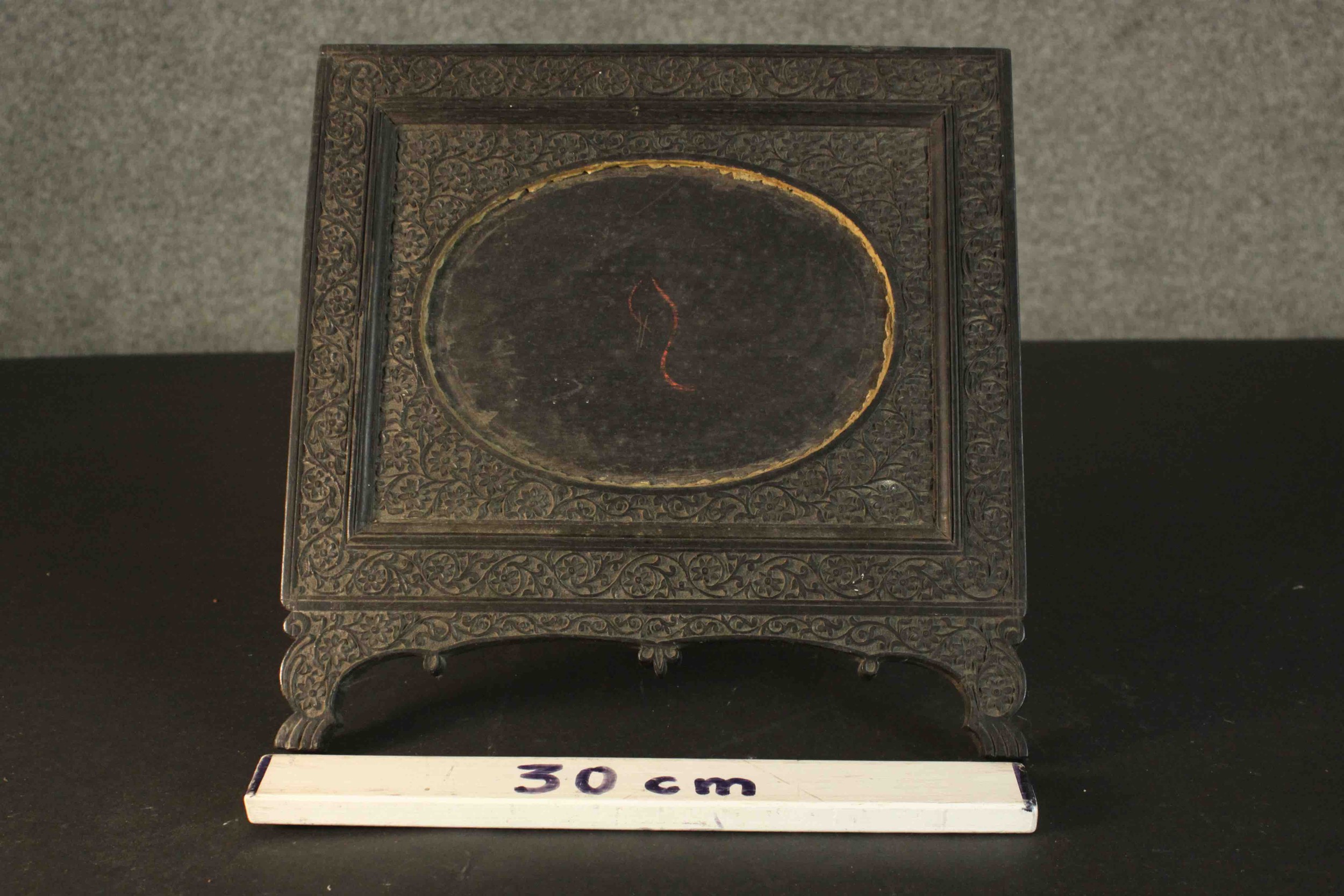 An Anglo-Indian ebonised carved easel picture frame with floral design and oval cartouche to centre. - Image 3 of 8