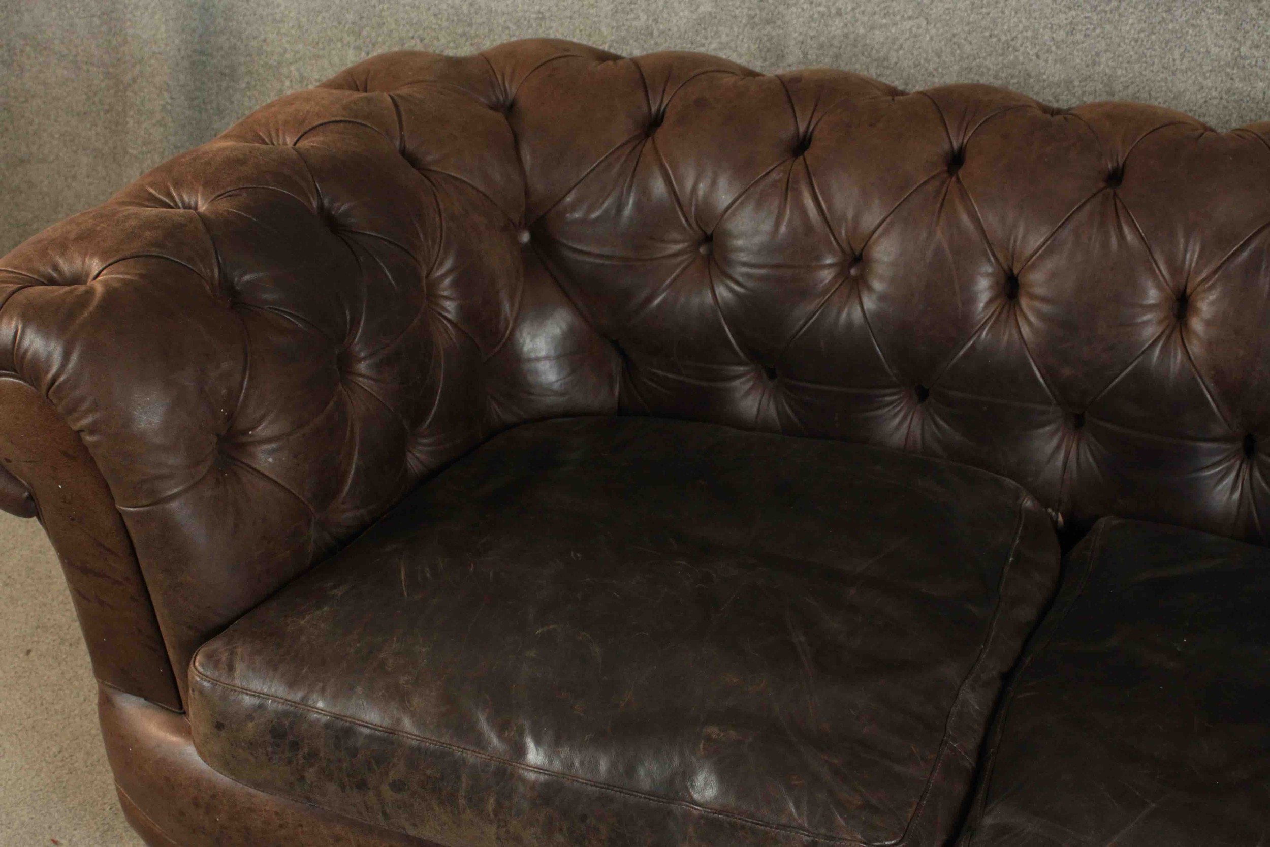 A contemporary brown leather Chesterfield sofa, with buttoned scrolling arms and back, on turned - Image 3 of 11