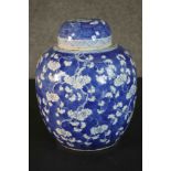 A large 19th century Chinese blue and white lidded hand painted porcelain prunus blossom design