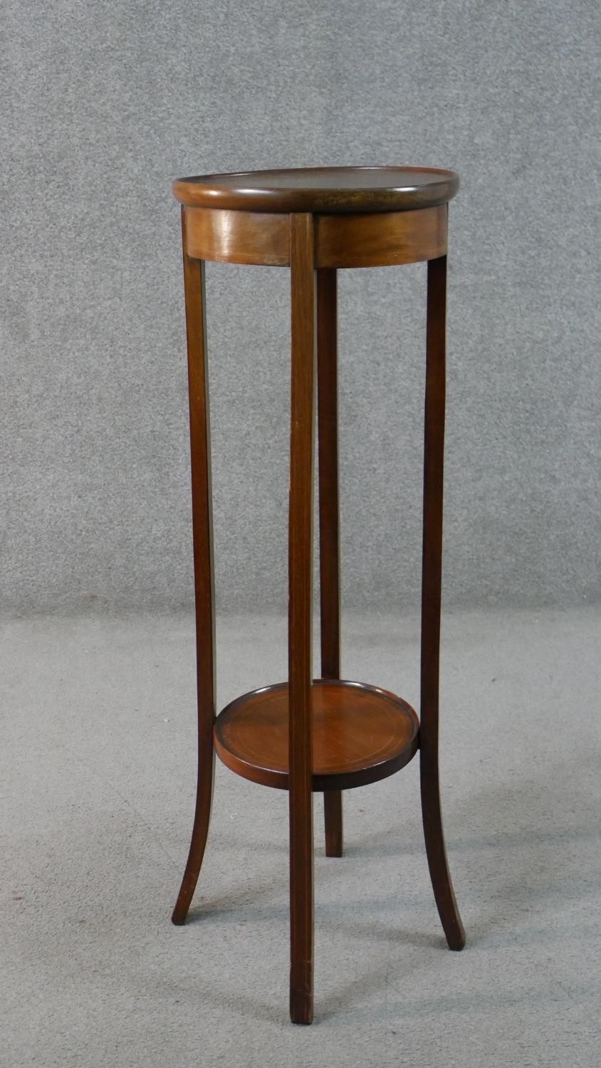 An Edwardian walnut jardiniere stand, with a circular line inlaid top over a circular undertier with - Image 2 of 5