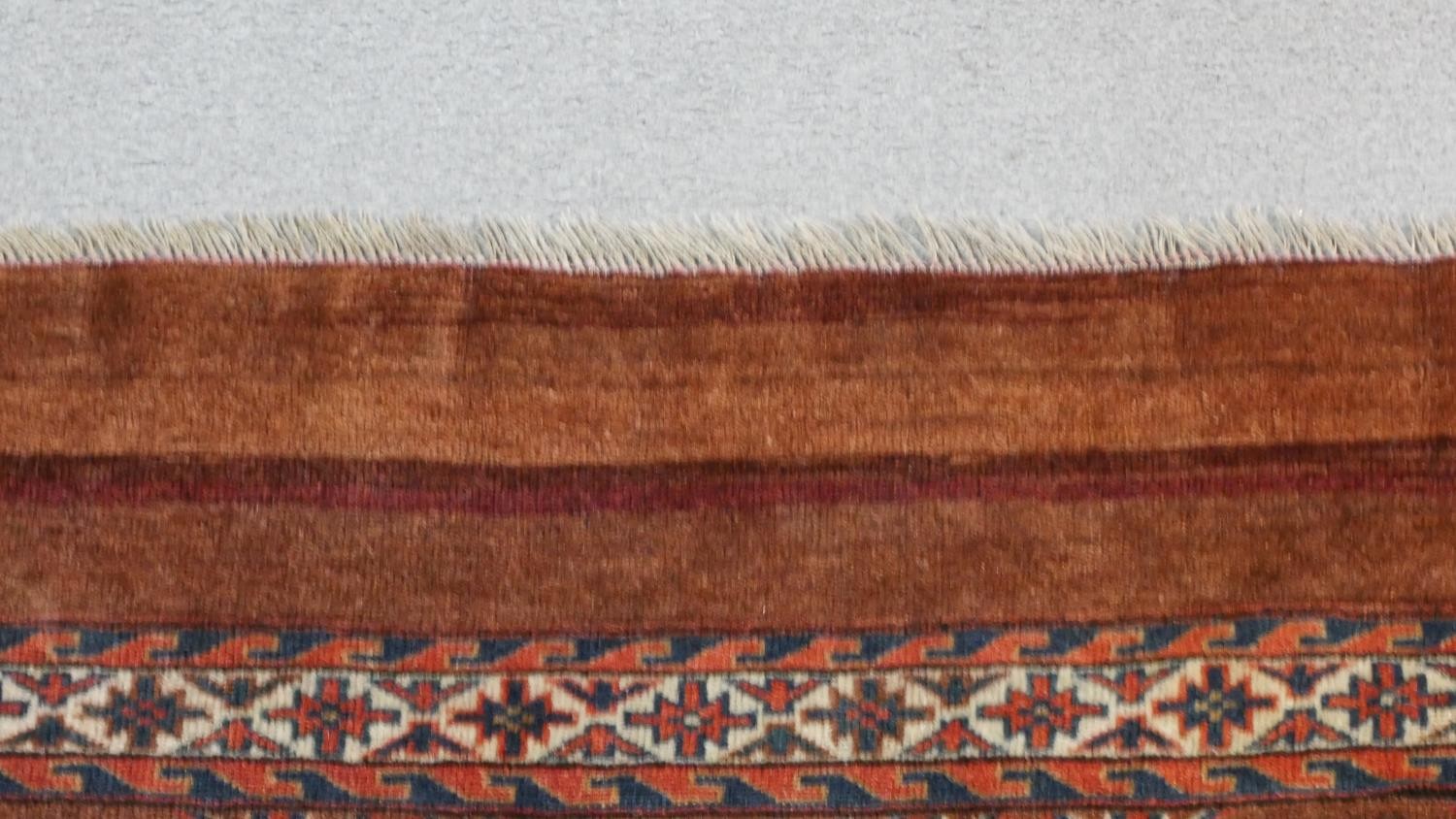 A hand made ochre ground Persian Turkmen rug. L.113 W.78cm - Image 3 of 4