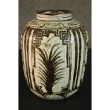 A Chinese early 20th century Cizhou ware vase with all over foliate decoration. H.26 Dia.19cm.