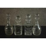 A pair of late 19th century cut glass decanters and two later hand cut crystal decanters, each