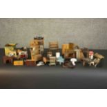 A large collection of early 20th century doll's house furniture and items. H.17 W.10 D.6cm. (