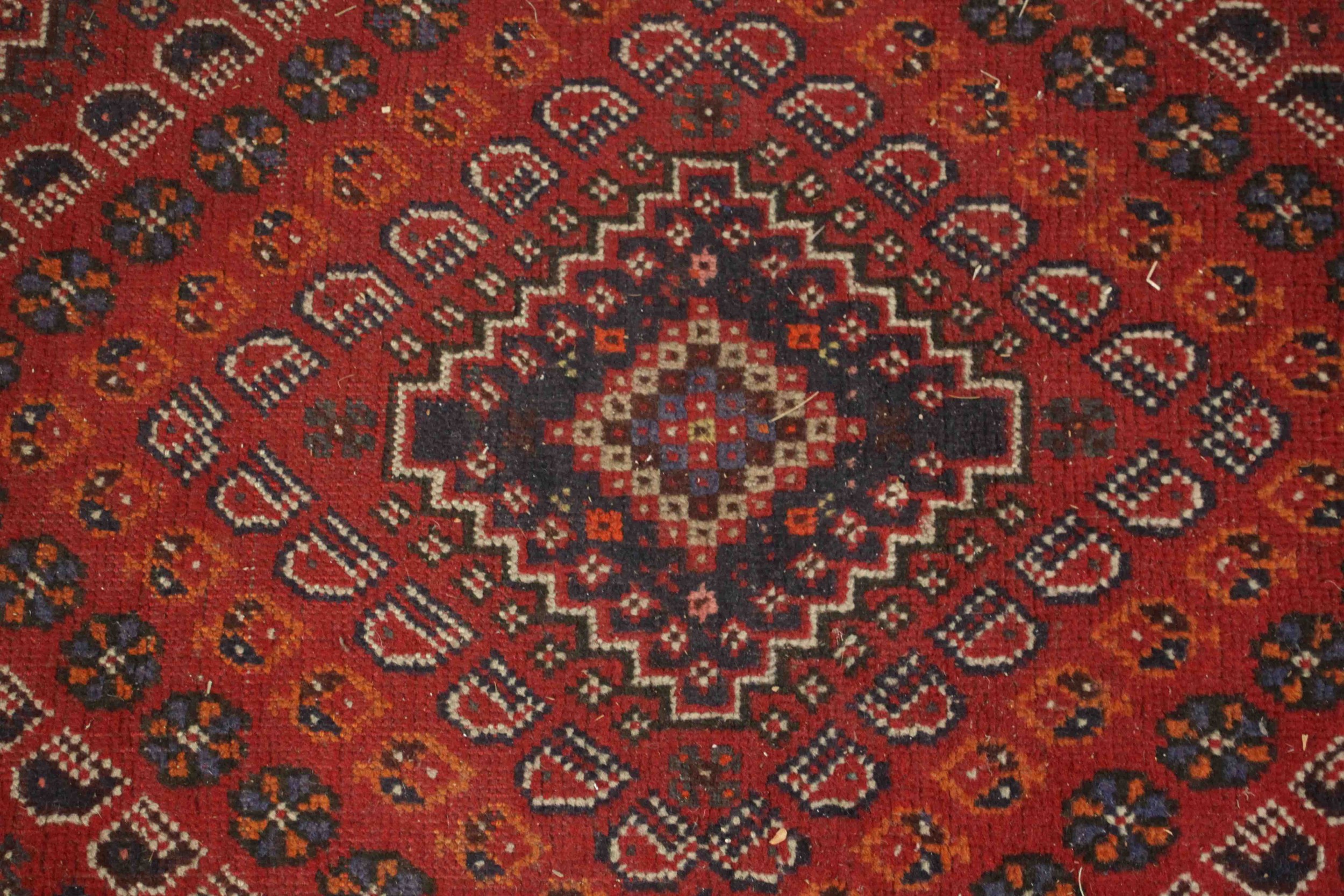 A Persian Shiraz the central medallion with stylised floral motifs on a burgundy ground within - Image 3 of 5