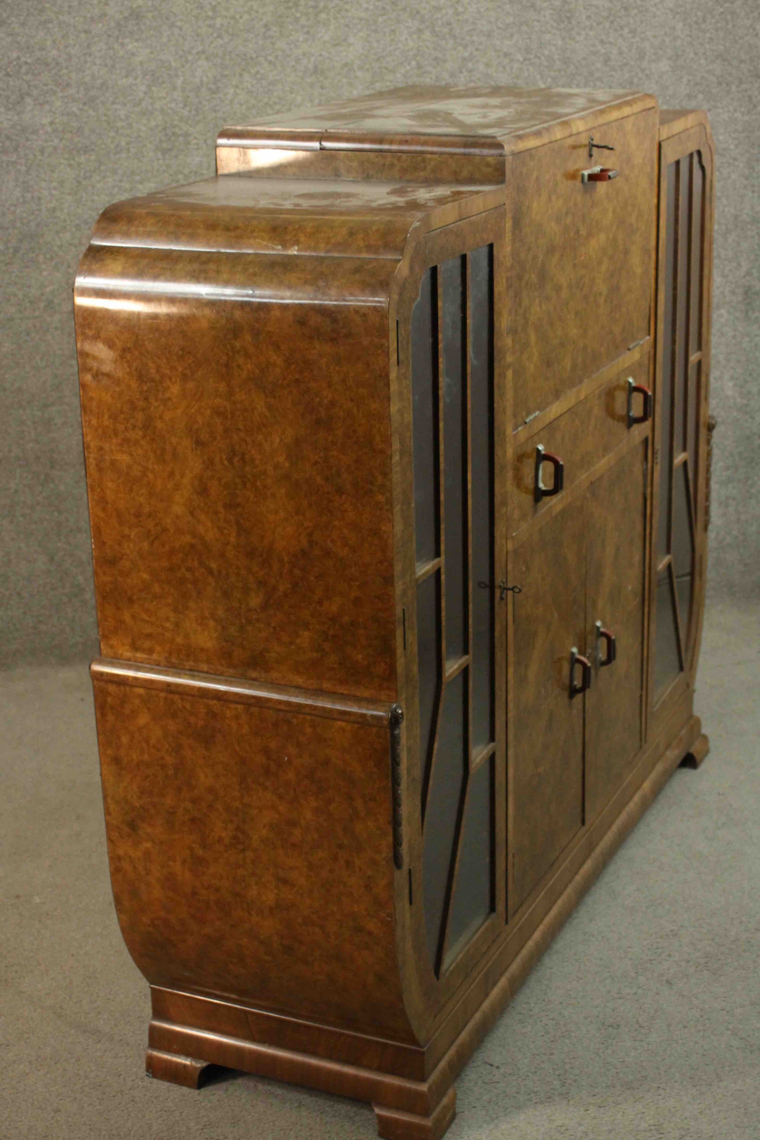 An Art Deco burr walnut cocktail cabinet with fitted and mirrored central mixing section flanked - Image 13 of 17