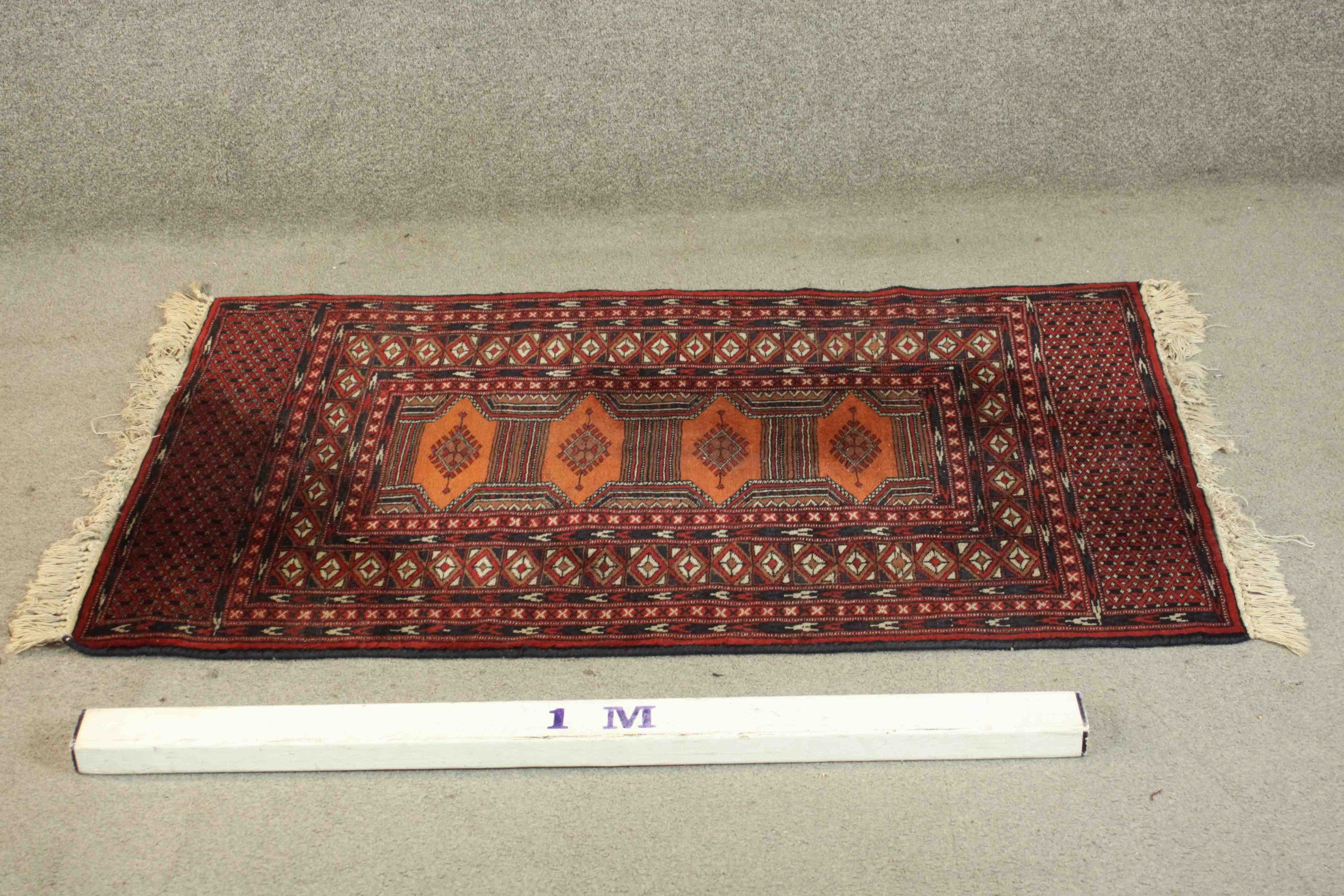 A Pakistan Bokhara rug with repeating pole medallions within multiple borders. L.126 W.80cm. - Image 2 of 5
